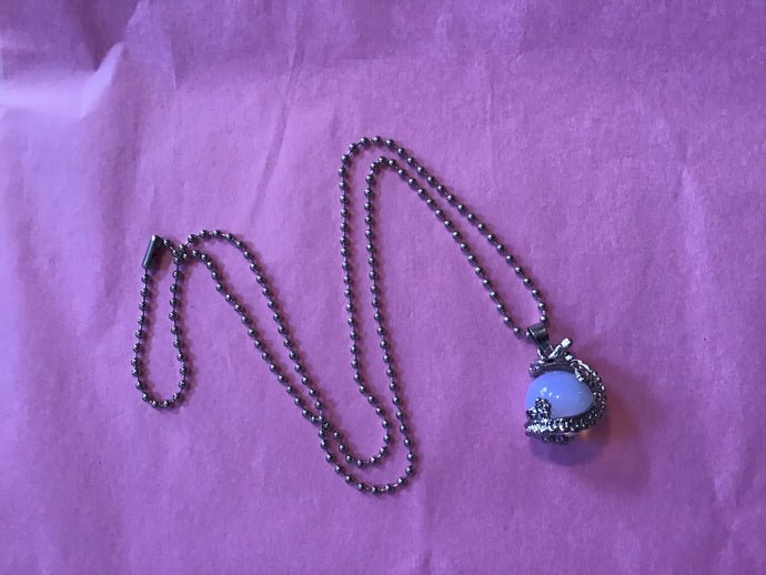 Silver Dragon Holding Moonstone Charm